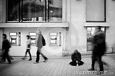 A Homeless Person Begging on the Champs Elysees Editorial Stock Photo