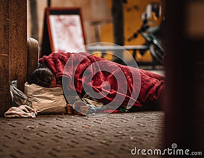 Homeless sleeping on the street Editorial Stock Photo