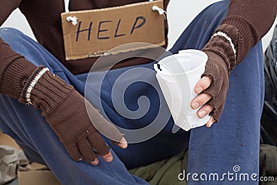 Homeless waiting for alms Stock Photo