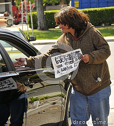 Homeless Woman Receiving Help Stock Photo