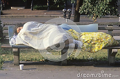 Homeless women sleeping on bench, Washington D.C. Editorial Stock Photo