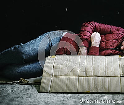 Homeless Women Sleeping on Street Stock Photo