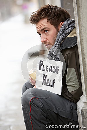 Homeless Young Man Begging In Street Stock Photo