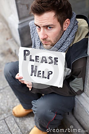 Homeless Young Man Begging In Street Stock Photo