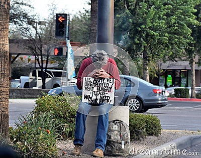 Homeless US Army Veteran Sitting on a corner in Mesa, Arizona Editorial Stock Photo