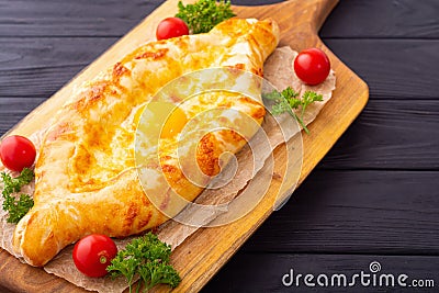 Homemade adjarian khachapuri with egg Stock Photo