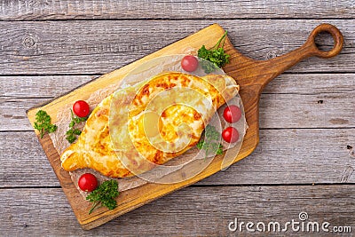 Homemade adjarian khachapuri with egg Stock Photo