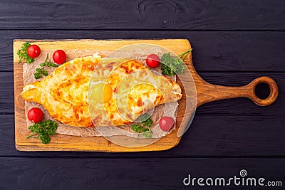 Homemade adjarian khachapuri with egg Stock Photo