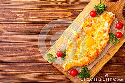 Homemade adjarian khachapuri with egg Stock Photo