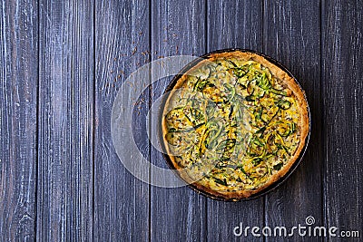 Homemade baked zucchini quiche with cumin Stock Photo