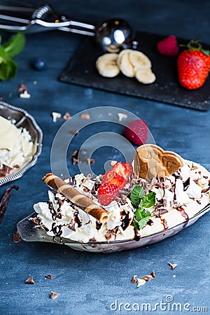 Homemade Banana Split with ice cream and chocolate. Stock Photo