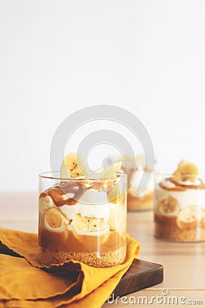 Homemade banoffee pie in a glass cup Stock Photo