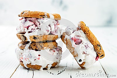 Homemade Black Forest roasted cherry ice cream sandwiches with chocolate chip cookies. Stock Photo