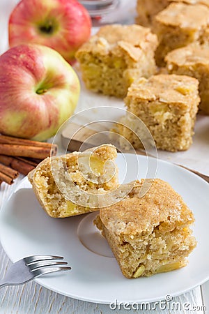 Homemade blondie (blonde) brownies apple cake, square slices on plate Stock Photo