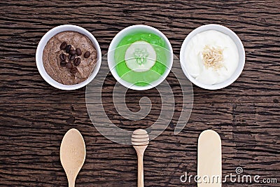 Homemade body scrubs on wood background. Stock Photo