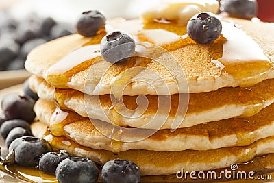 Homemade Buttermilk Pancakes with Blueberries and Syrup Stock Photo