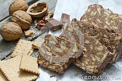 Homemade cake with chocolate nuts and biscuits Stock Photo