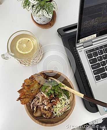 Homemade Chicken porridge and infused lemon water Stock Photo