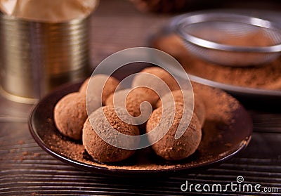 Homemade chocolate balls truffles on the plate. Stock Photo