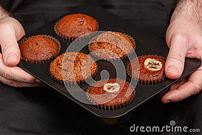 Homemade chocolate, banana and caramel muffins Stock Photo