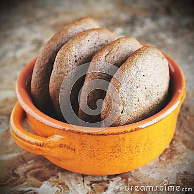 Homemade chocolate cookies for snack. Chocolate chip cookies shot in ceramic jar Stock Photo