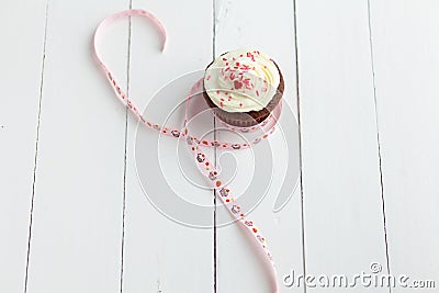 Homemade chocolate cupcake on wooden table Stock Photo