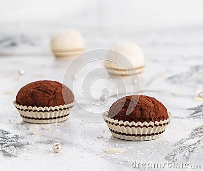 Homemade Chocolate truffles candy dessert on light marble background. Delicious praline for holiday, close up Stock Photo