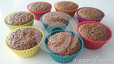 Homemade cocoa muffins in colorful silicone baking cups Stock Photo