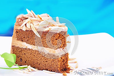 Homemade coffee almond cake on dish Stock Photo