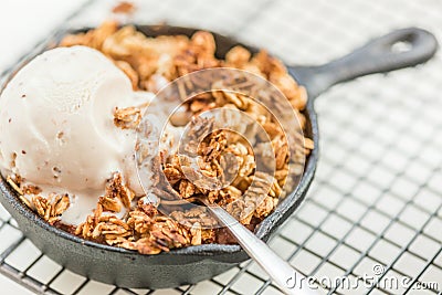 Homemade cooked rhubarb and apple crumble with oatmeal and vanil Stock Photo