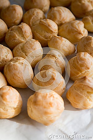 Top view of apetizing profiteroles. Homemade cookery and bakery Stock Photo