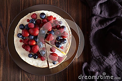 Homemade creamy mascarpone New York Cheesecake. Top viev. Cheese cake with strawberry .Cream mousse dessert. Stock Photo