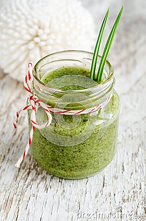 Homemade exfoliating scrub for face and body with herbal extracts green tea. DIY cosmetics and spa Stock Photo