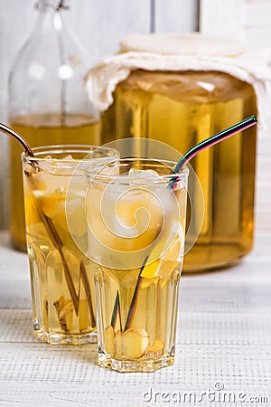 Homemade fermented kombucha tea drink with lemon and ginger Stock Photo