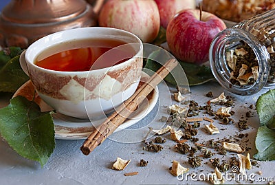 Homemade fermented tea made from fresh apple leaves with dried apple pieces Stock Photo