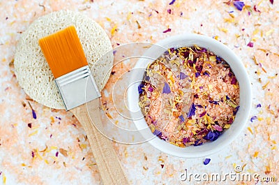 Homemade floral bath salts foot soak, fizzies, exfoliation scrub with dead sea salt, essential oil and dry flower petals Stock Photo