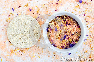 Homemade floral bath salts foot soak, fizzies, exfoliation scrub with dead sea salt, essential oil and dry flower petals Stock Photo