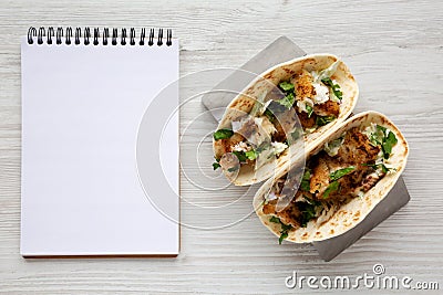 Homemade Fresh Fish Tacos, blank notepad, top view. Flat lay, overhead, from above. Close-up Stock Photo