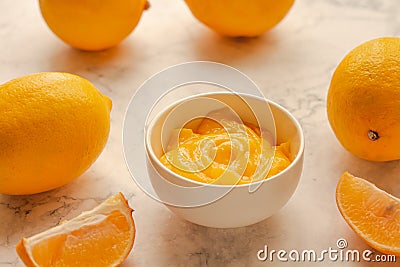 Homemade fresh pudding or tangy lemon curd in a white bowl.Selective focus Stock Photo