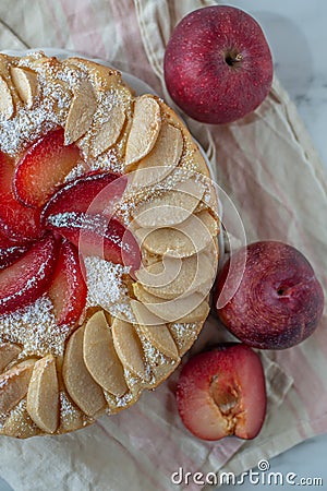Homemade galette with apple and plum Stock Photo
