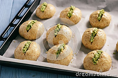 Homemade garlic bread rolls on wooden background. Stock Photo