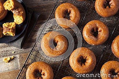 Homemade Glazed Autumn Pumpkin Donuts Stock Photo