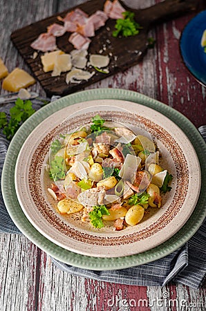 Homemade gnocchi with parmesan chicken Stock Photo