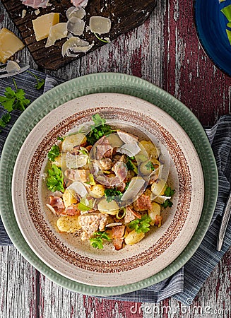 Homemade gnocchi with parmesan chicken Stock Photo