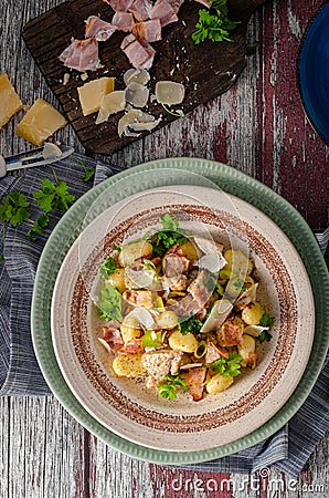 Homemade gnocchi with parmesan chicken Stock Photo