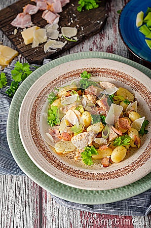 Homemade gnocchi with parmesan chicken Stock Photo