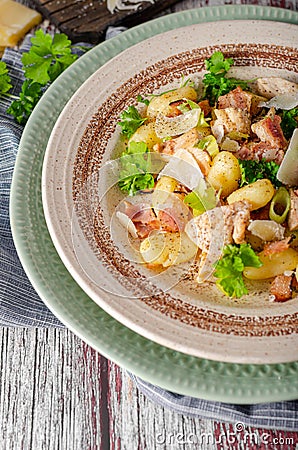 Homemade gnocchi with parmesan chicken Stock Photo