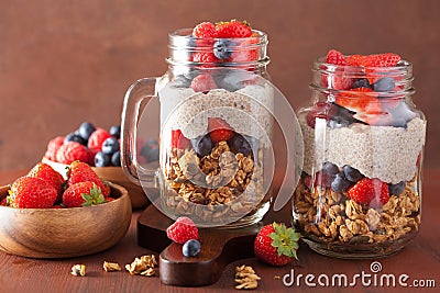 homemade granola and chia seed pudding with berry healthy breakfast Stock Photo