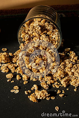 Homemade granola with nuts and seeds in eco tableware jar. Healthy snack on breakfast. Muesli from oatmeal, raisins Stock Photo