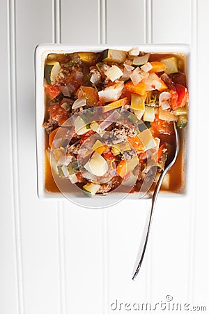 Gumbo soup in white bowl above shot Stock Photo